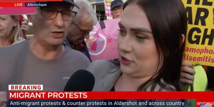 GB News Reporter Struck by Stand Up To Racism Protester’s Placard During Heated Altrincham Demonstration